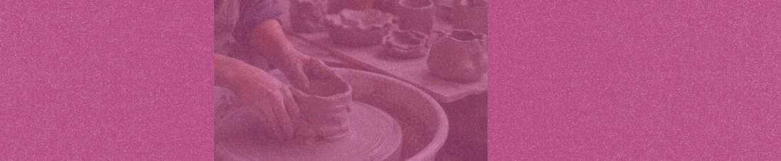 Hands shaping a collapsing clay pot on a pottery wheel with imperfect ceramic pieces in the background.